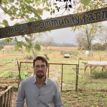 Professor Muchnick at the Kate Chandler Campus Community Farm